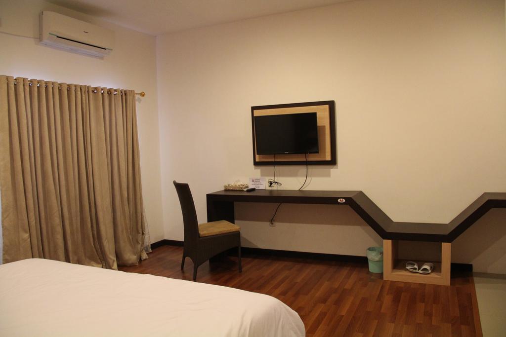Kampoeng Nelayan Hotel Palu Værelse billede
